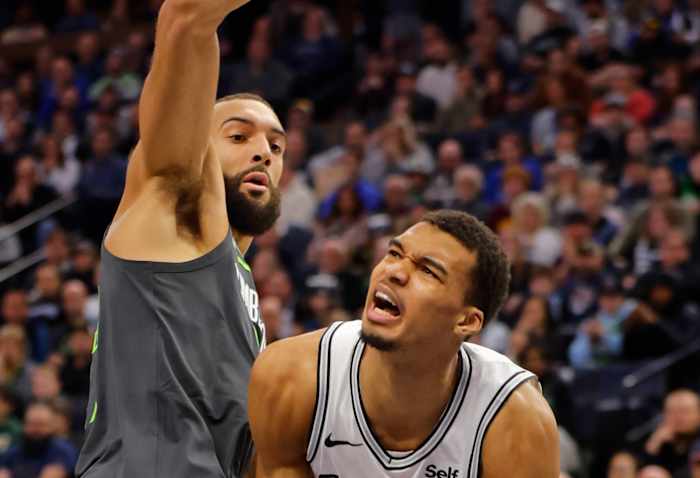Dec 6, 2023; Minneapolis, Minnesota, USA; San Antonio Spurs forward Victor Wembanyama (1) works around Minnesota Timberwolves center Rudy Gobert (27) in the second quarter at Target Center.